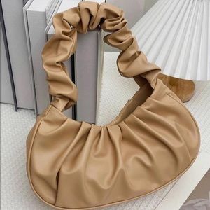 Beige Snatched Purse .